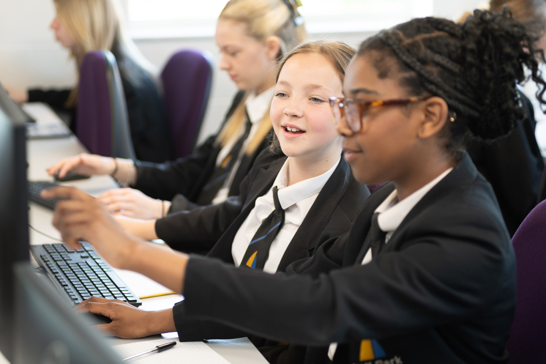 Cliff Park girls in IT class with computer